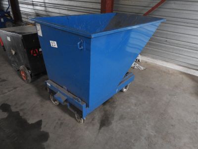 an image of a blue dumpster in a garage