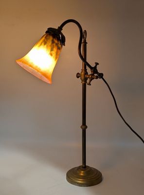 an image of a lamp that is on top of a table