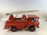 a red toy fire truck with a ladder on top of it