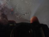 a person holding a camera and taking a picture