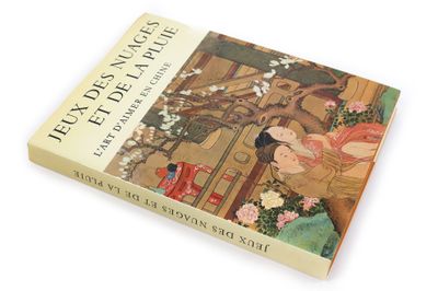 un livre dont la couverture représente une femme dans un jardin