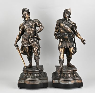 pair of antique bronze figurines of a roman soldier and a roman soldier