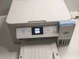 a printer that is sitting on top of a table