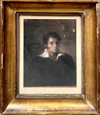 portrait d'un homme en manteau noir, dans un cadre doré