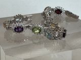 two bracelets on display on a clear display case