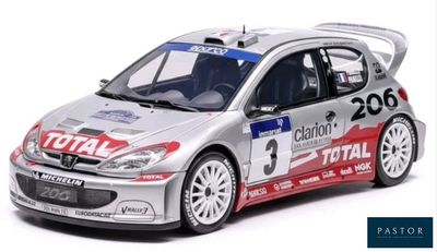 the toy car is silver and red with a number on the side
