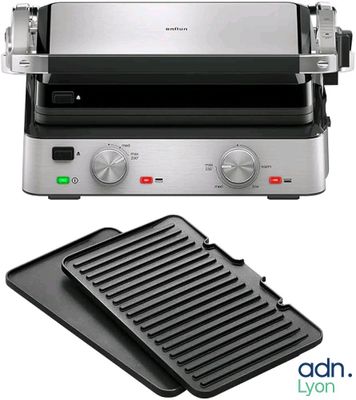 a close up of a grill and a pan on a white background