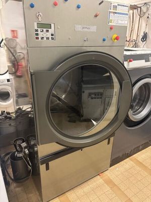 an image of a washer and dryer in a laundry room
