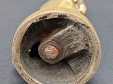 a close up of a metal object on a table