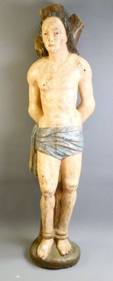 une statue représentant un homme avec un oiseau sur l'épaule