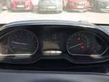 a dashboard of a car with a lot of cars in the background