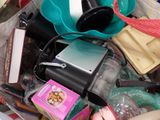 a bag full of items that are sitting on the floor