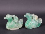 pair of carved green jade ducks