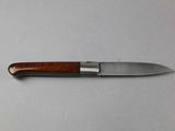 a knife that is sitting on a table