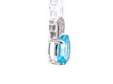 a necklace with a blue stone in it on a white background