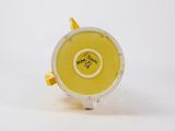 yellow and white porcelain vase with a yellow handle and a white base