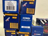 several boxes of corgi film are stacked on top of each other