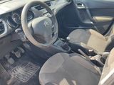 a picture of a car with a steering wheel and dashboard
