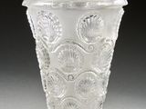 a glass vase that is sitting on a table