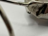 a pair of scissors that are on a white surface