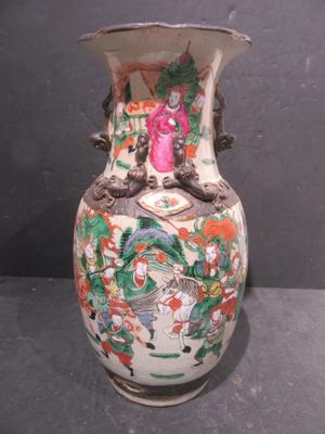 a vase that has a picture of a woman on it