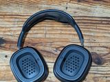 a pair of headphones sitting on a wooden table