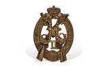 a close up of a metal badge with a horse on it