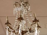 a chandelier hanging from the ceiling in a store