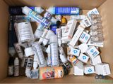 a cardboard box filled with many different types of medicine