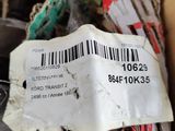 a label on a pile of assorted items in a box