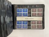 a black case with stamps on it that has a name on it