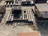 many pieces of wood and other items that are on the ground