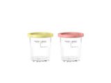 two blenders sitting next to each other on a white surface