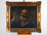 un vieux tableau représentant un homme barbu posé sur un chevalet