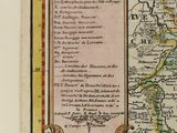 an old map with a picture of a town on it