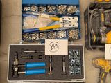 many tools that are laying out on the floor