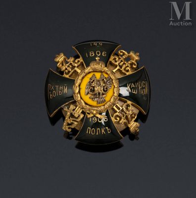 an image of a gold and black badge with a lion on it