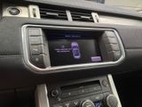 the dashboard of a car with a radio and a blue screen