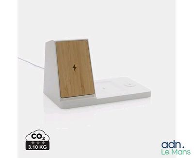 a wooden clock on top of a white charging dock