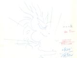 a drawing of a dragon on a piece of paper