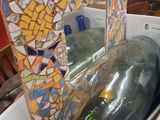 a box with a bottle of wine inside of it