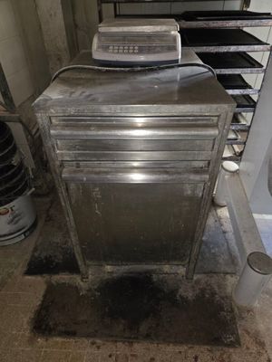 an image of a kitchen that has a lot of food on the counter