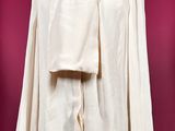 an image of a woman ' s shirt and skirt on a mannequin stand