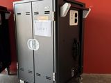 two metal lockers sitting next to each other in a room