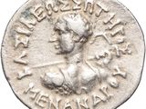 a silver coin with a bust of a man on it