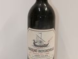 a bottle of wine that is sitting on a table