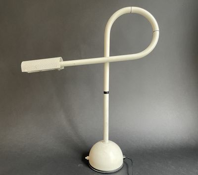 an image of a white lamp on a stand on a gray background