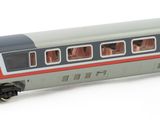 a toy train that is sitting on a white surface