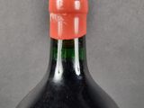 a bottle of wine that is sitting on a table