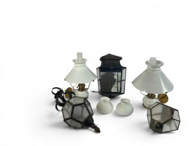 three lamps that are sitting next to each other on a white surface